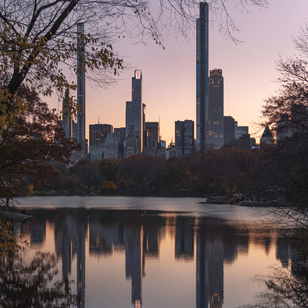 Colorful sunset with Central Park south as seen from the Oak Bridge.