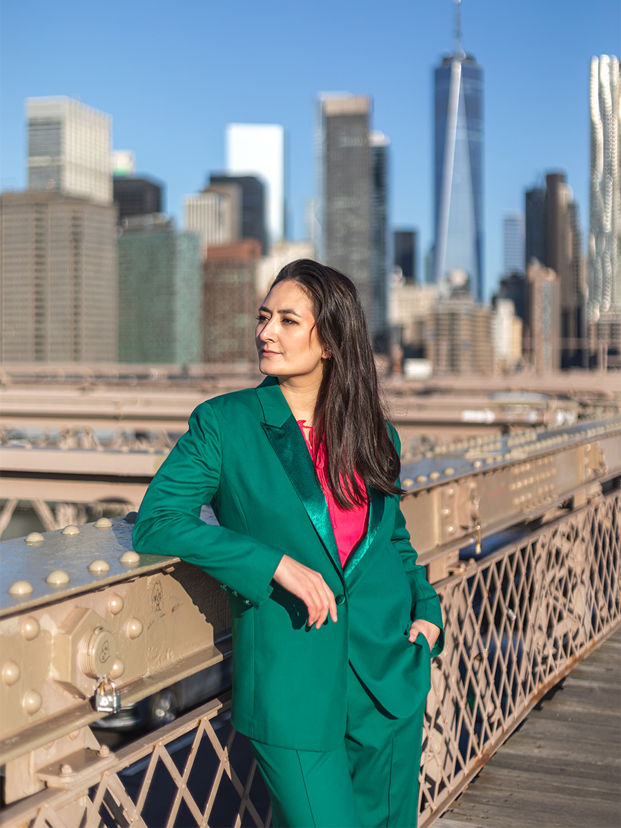 Sunrise portrait on the Brooklyn Bridge which is one of the best Brooklyn photography spots.