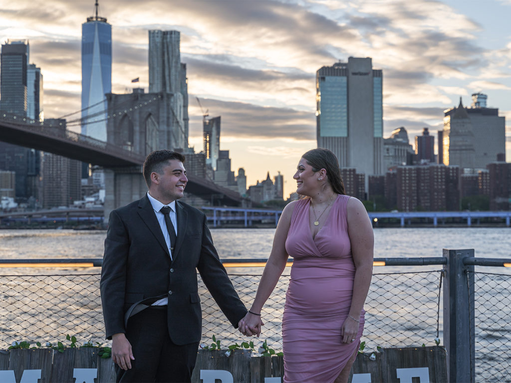 Couple's portrait at Jane's Carousel Brooklyn.