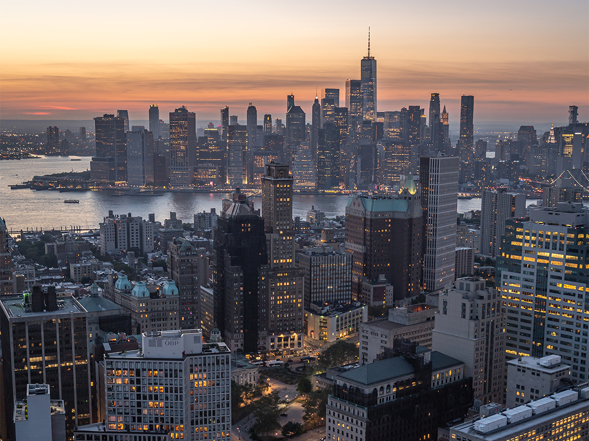 Stunning views of downtown Brooklyn and Manhattan during blue hour as seen from 11 Hoyt Brooklyn.