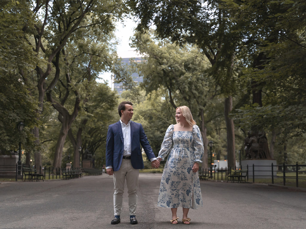 Neil Cato and his fiance Emily Hamilton hold hands in the middle of the Mall in Central Park.