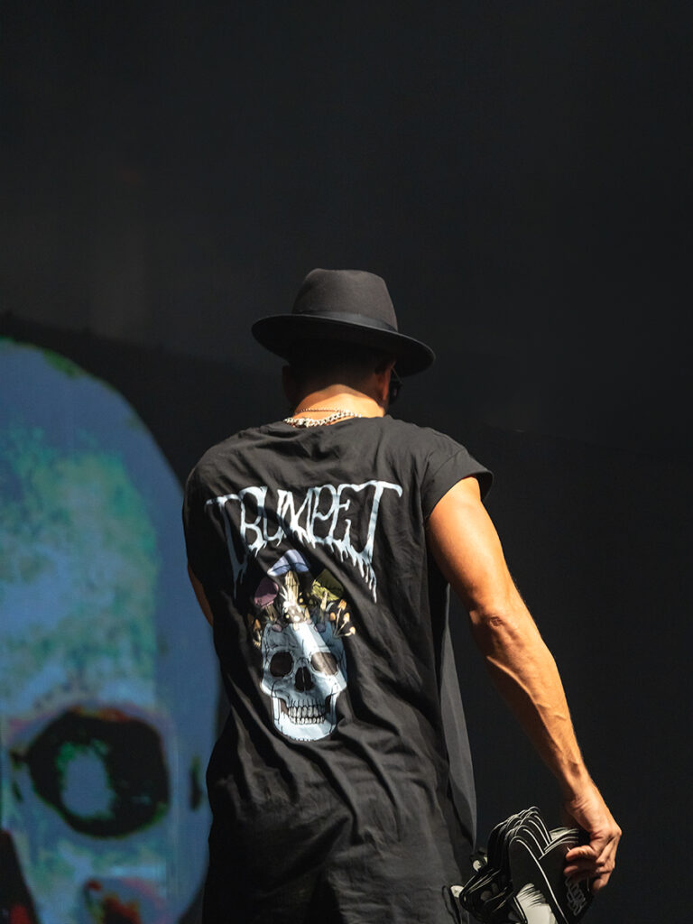 Timmy Trumpet performing on stage before Steve Aoki for his own concert photography moment.