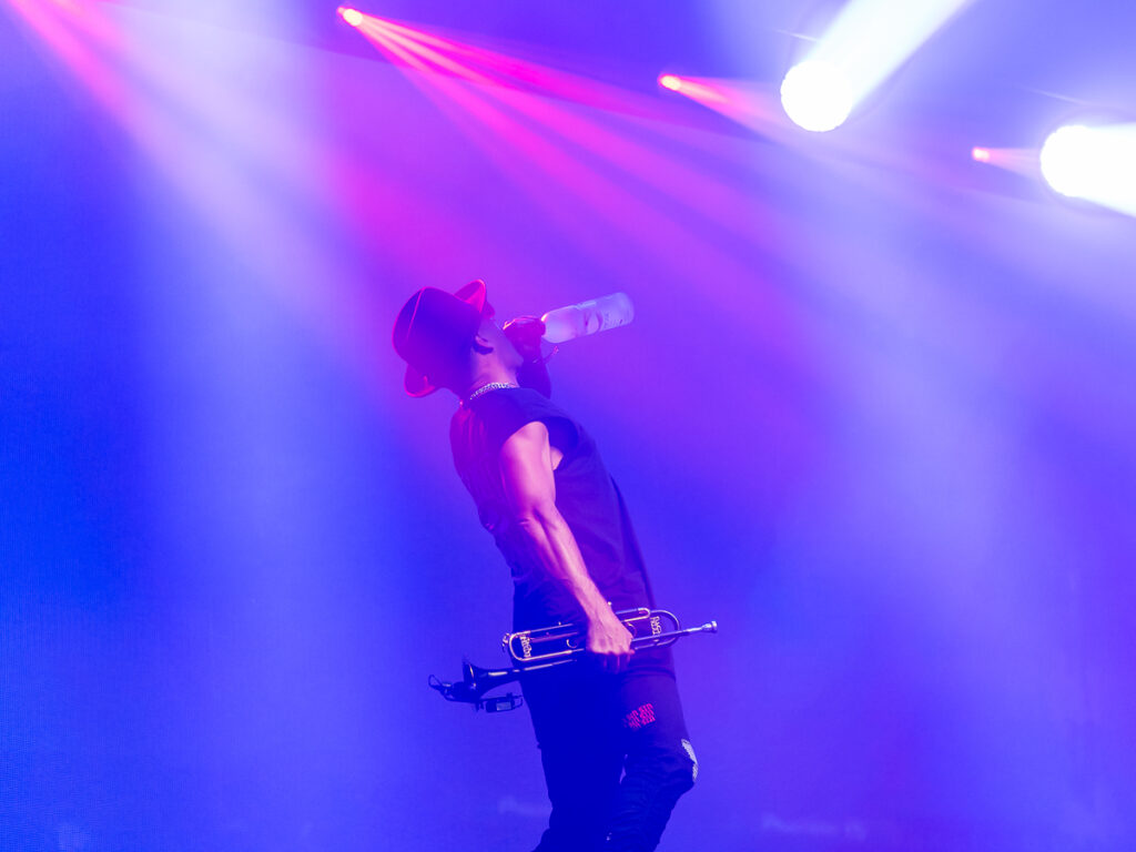 Timmy Trumpet performing on stage before Steve Aoki for his own concert photography moment.