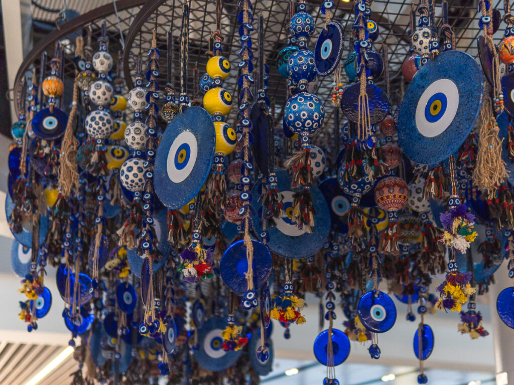 An evil eye chandelier hangs from the ceiling at Istanbul Airport (IST).