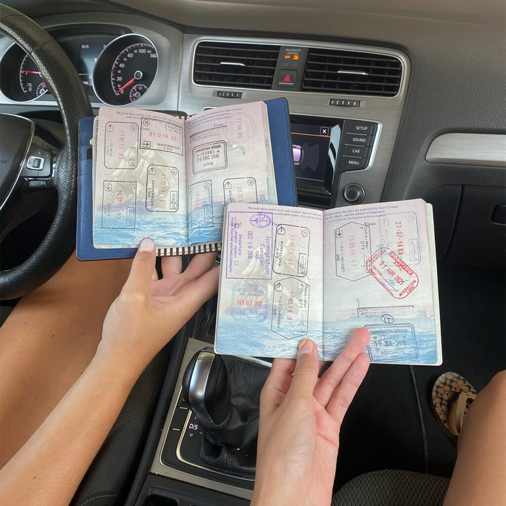 Two passports with multiple stamps from traveling around the Balkans as part of an Albania one week itinerary.