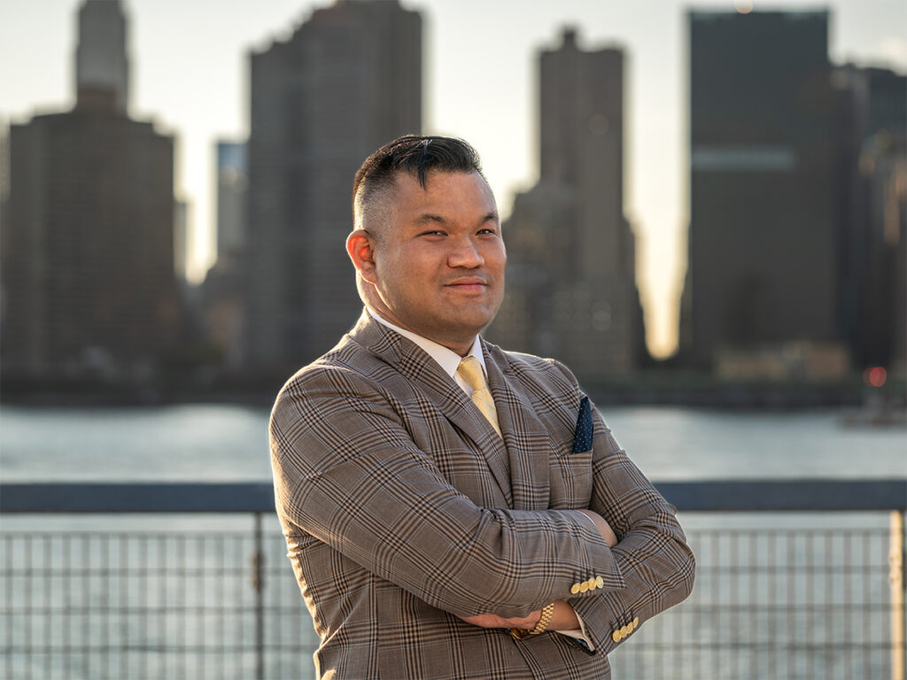 Professional natural light headshots during golden hour at Gantry Plaza State Park in Long Island City, Queens.