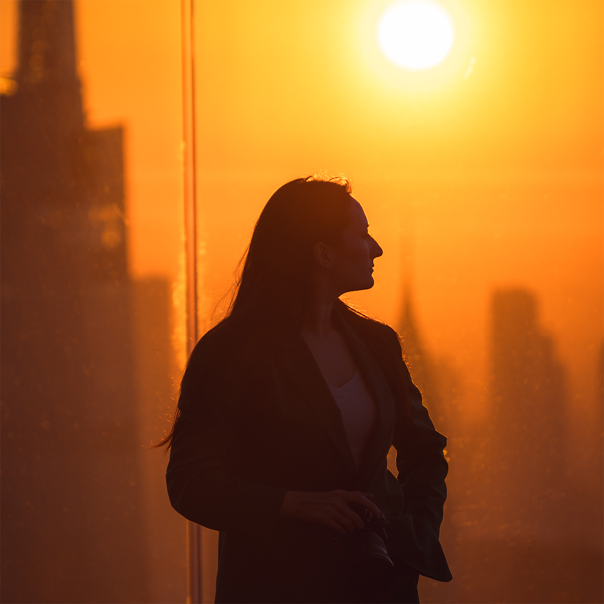 Silhouette from Edge NYC observatory sunrise.