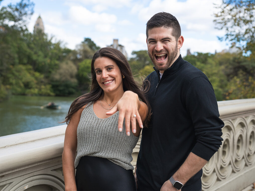 A successful surprise proposal at Bow Bridge in Central Park.