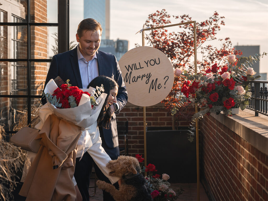 Getting proposed to at The Ludlow Hotel and accompanied by the family dog.