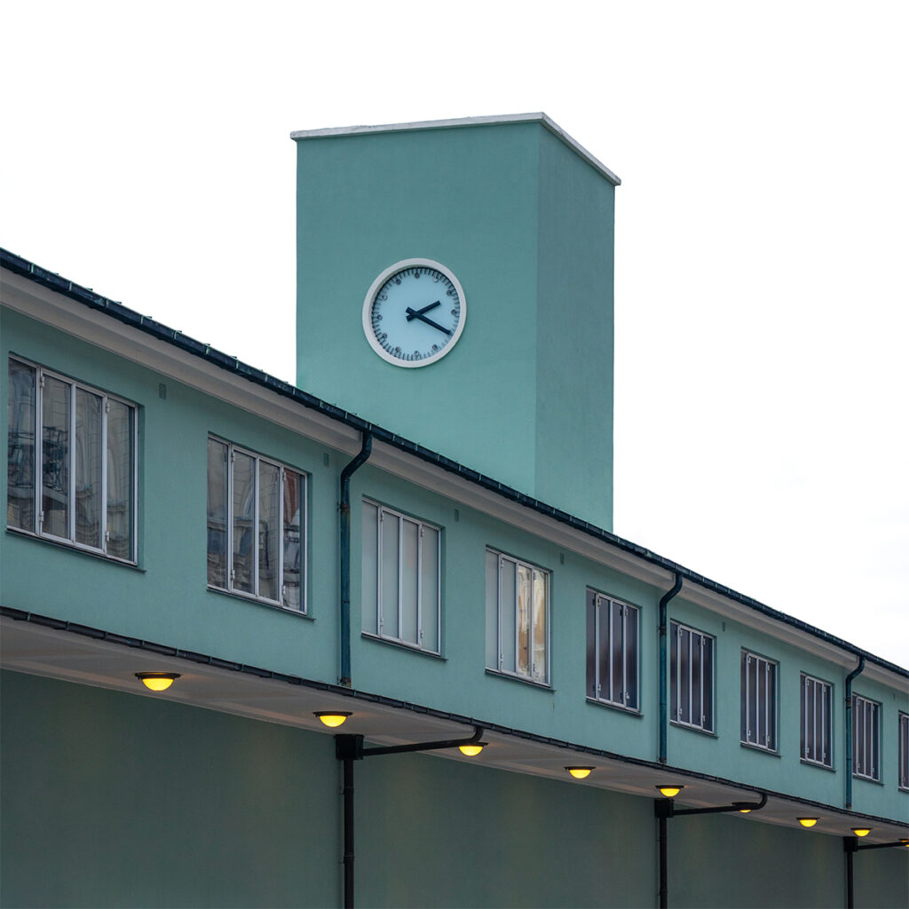 The restaurant exterior of a restaurant in Copenhagen is aqua colored.