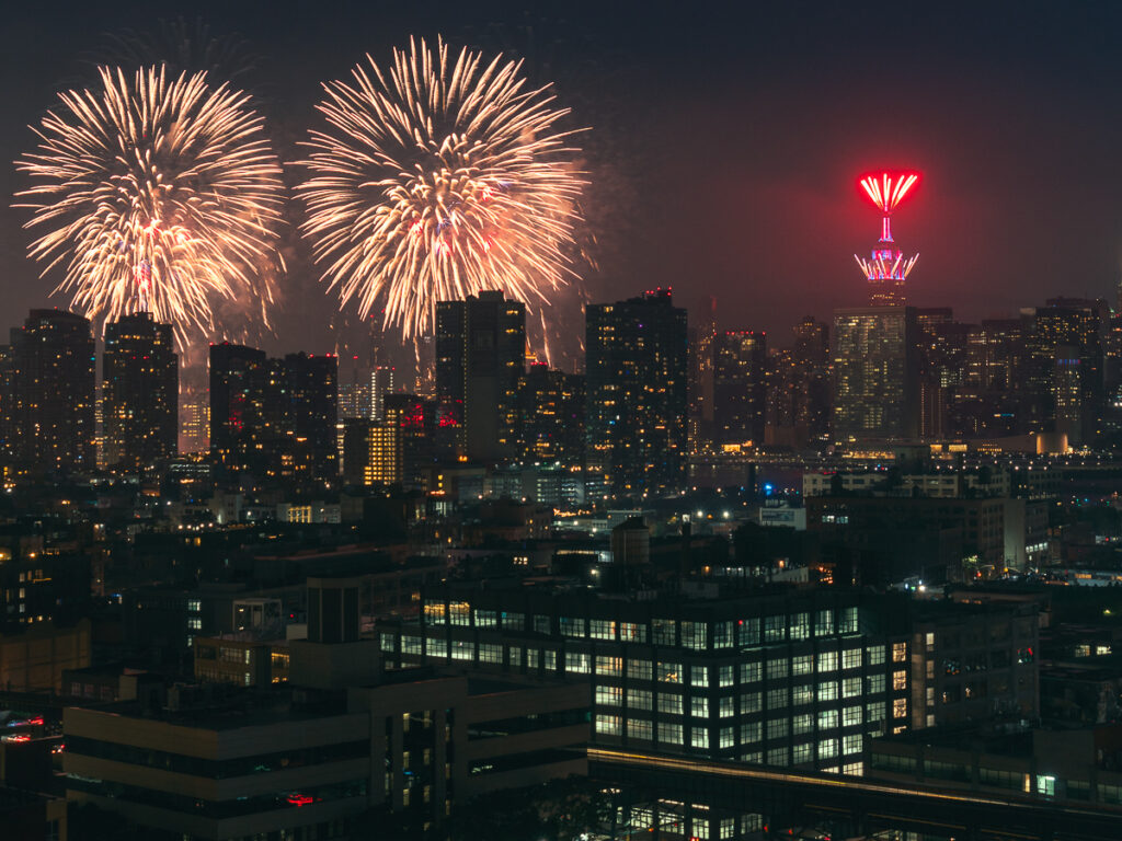 Photograph fireworks in Long Island City and see the Empire State Building light up.