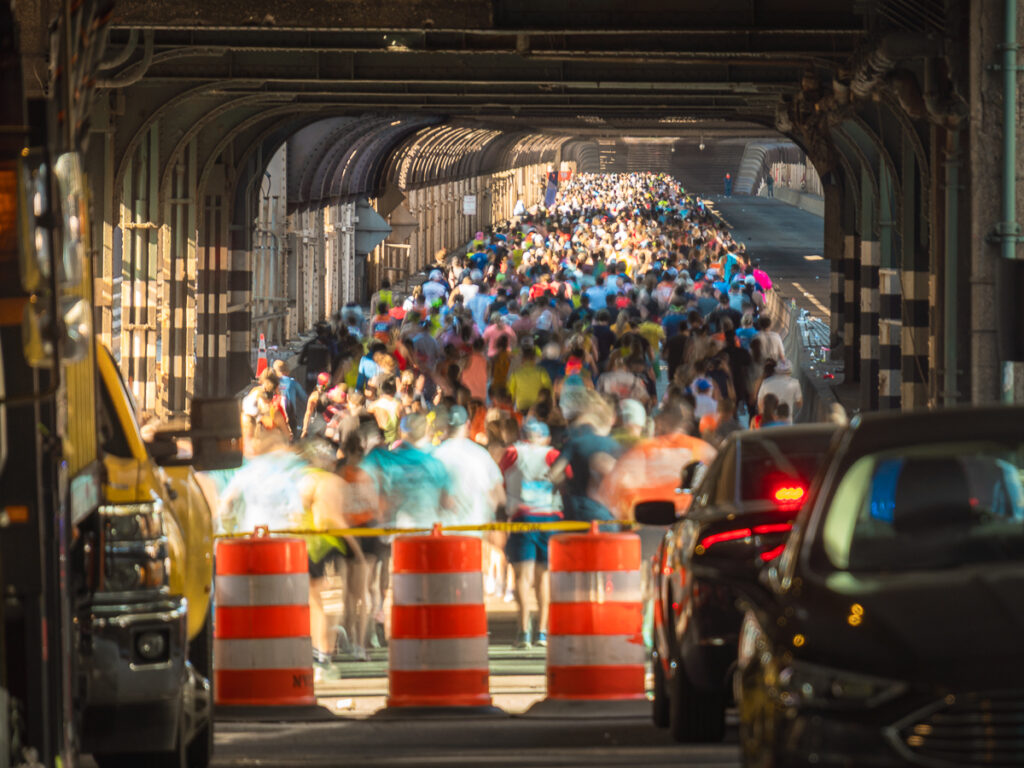 Marathoners run up the Queensboro Bridge during the NYC Marathon.