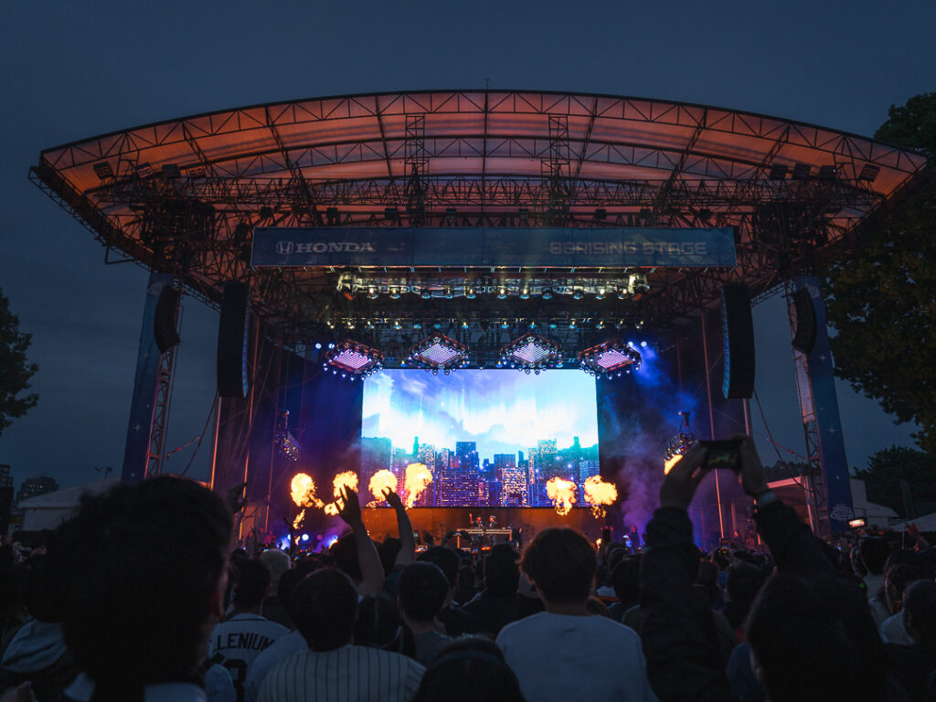 The stage at Forest Hills Stadium lights up with pyrotechnics for Head in the Clouds Festival.