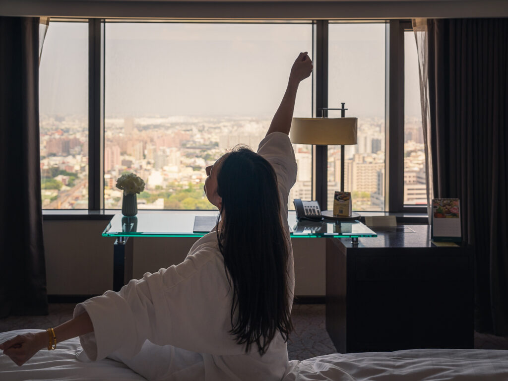 Stretching in a Deluxe Room of the Shangri-La Far Eastern, Tainan.