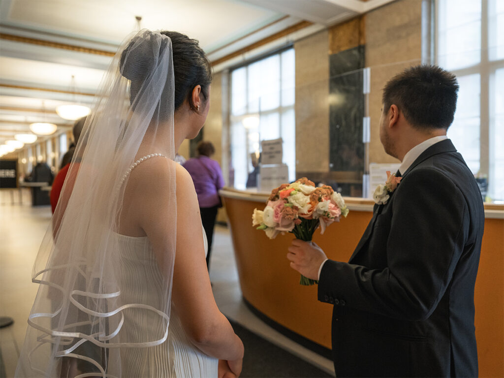 Couple waits anxiously for their NYC City Hall Elopement.