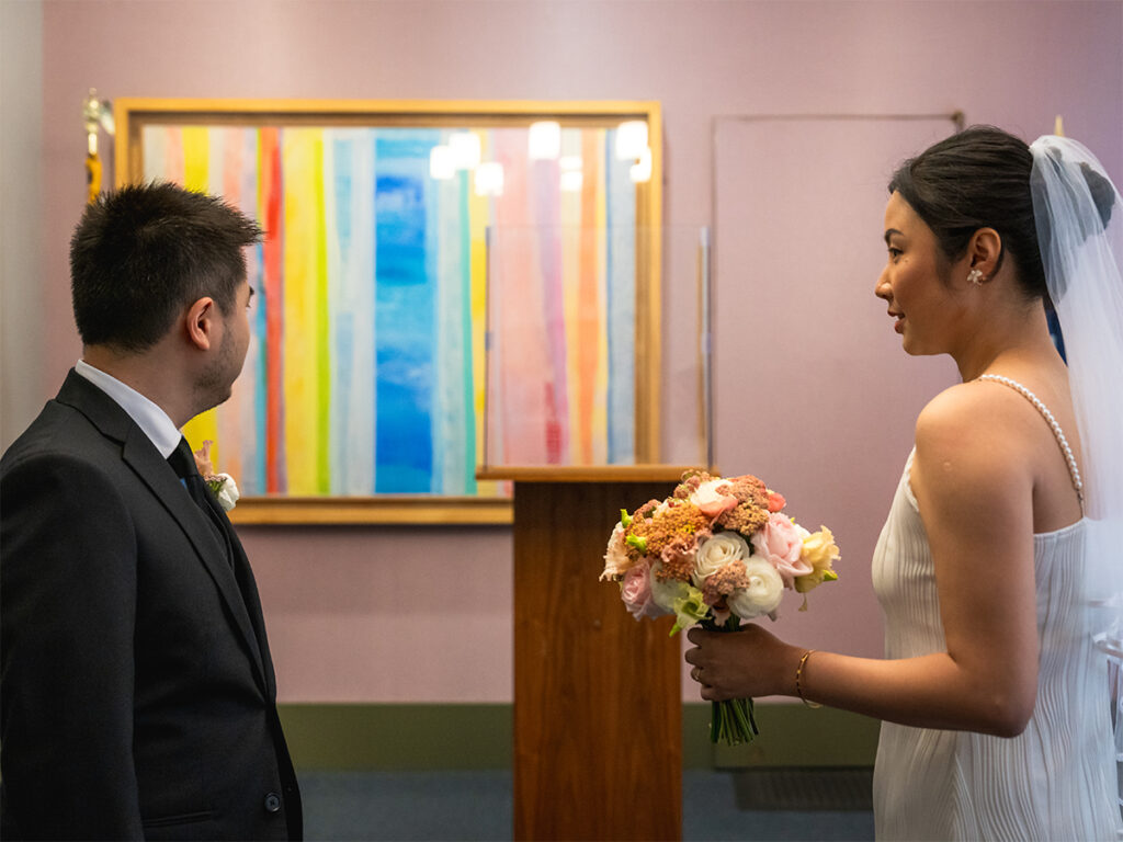 The couple ready to say their "I Do's" inside the marriage clerks office.