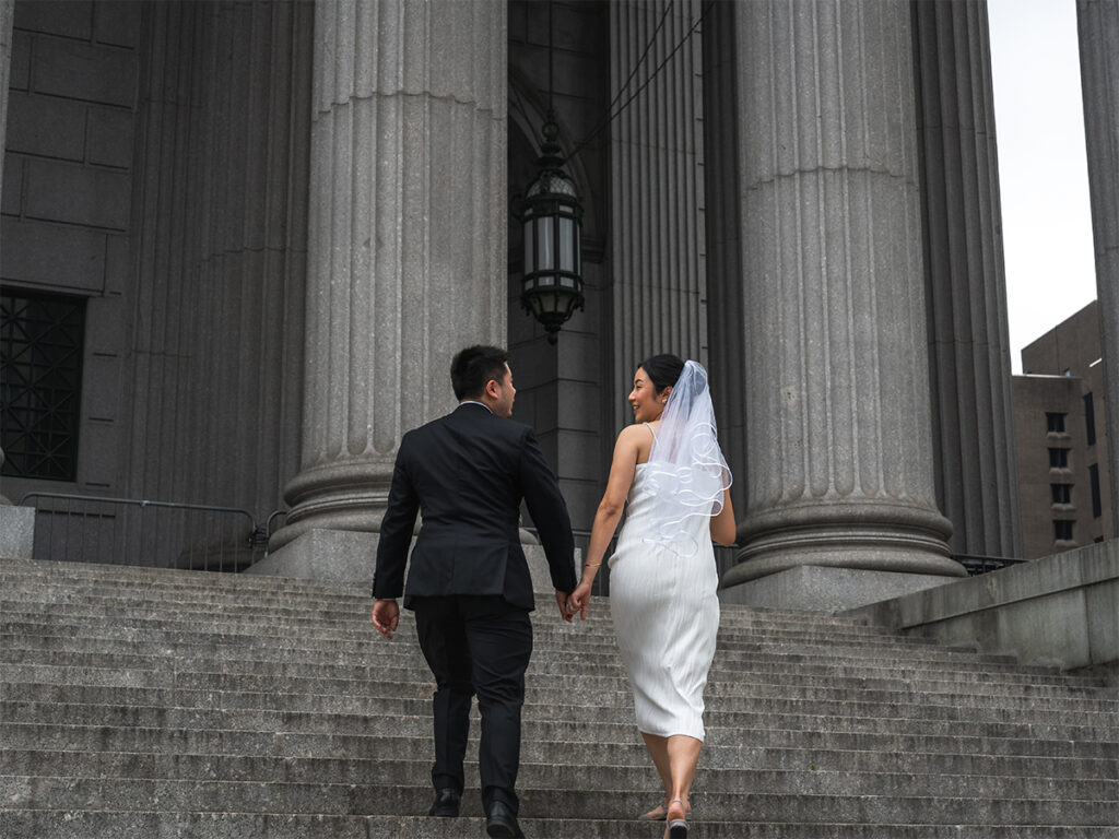 After a City Hall Elopement, capture some photos on the steps of the New York County Supreme Court next door.