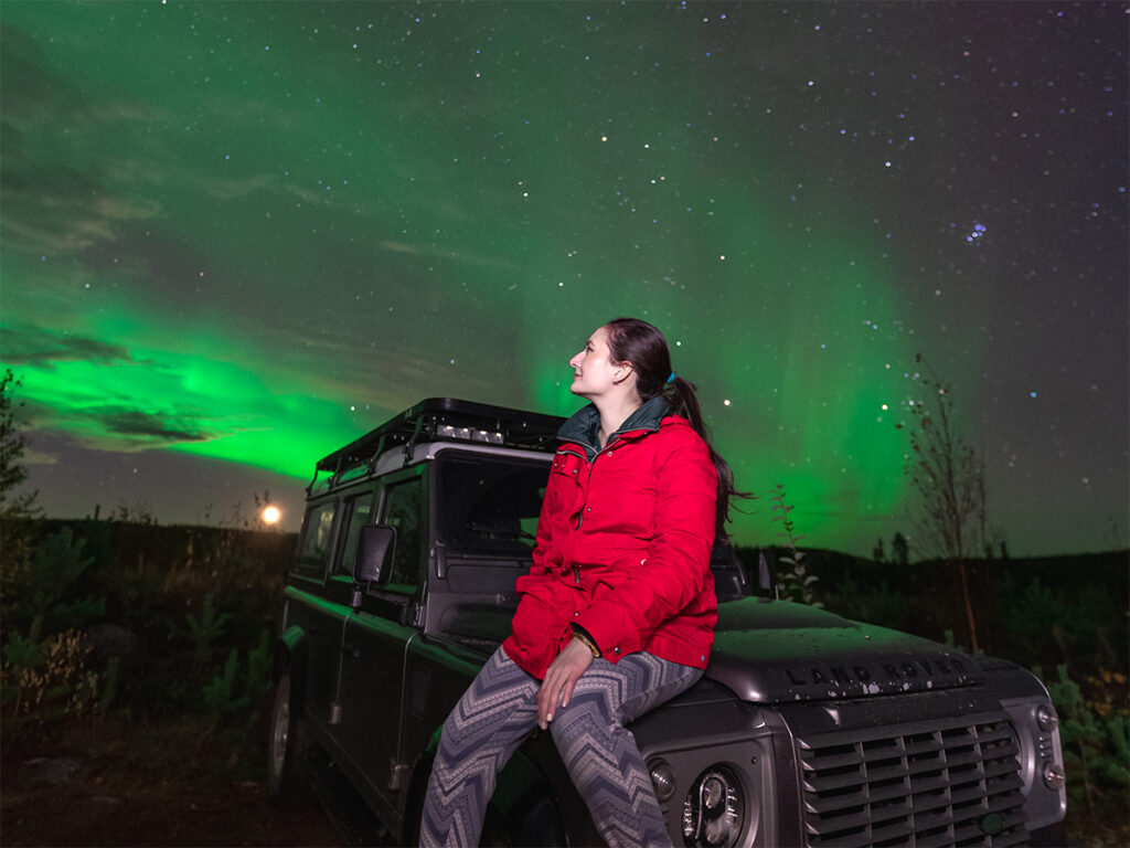 Chasing the Northern Lights in a Defender is a must do part of a Rovaniemi 7 day autumn itinerary.