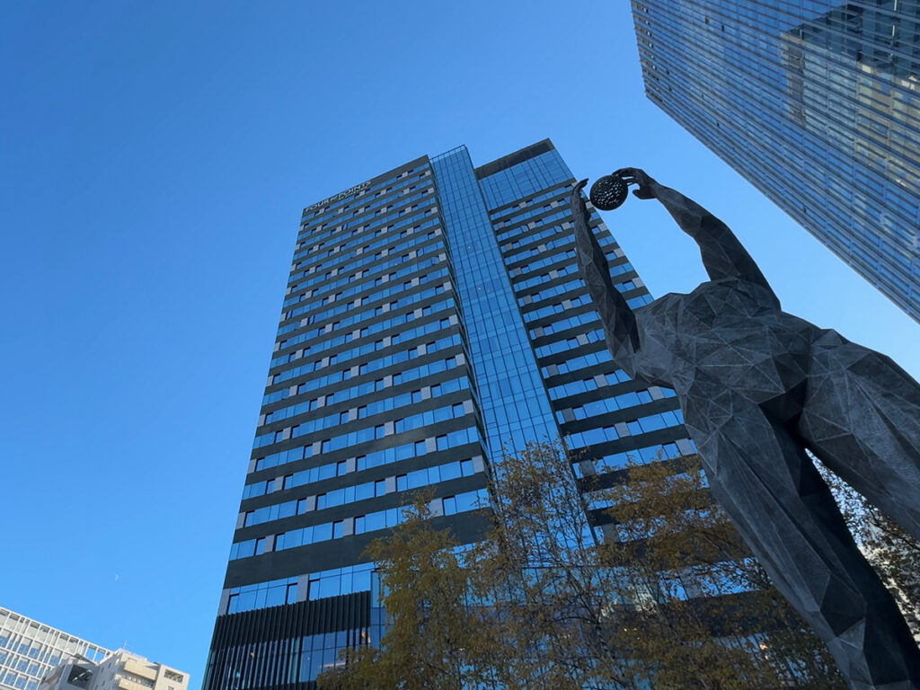 Exterior of Four Points by Sheraton Josun Seoul, Myeongdong with a statue in front.