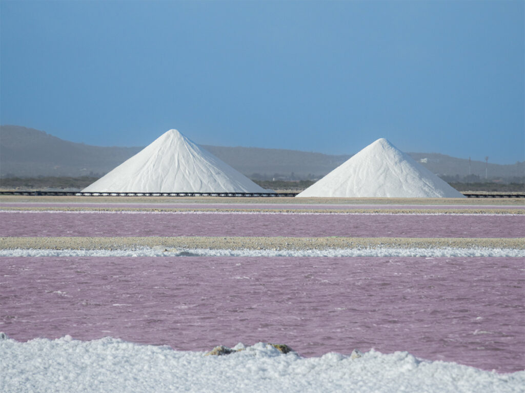 The famous Salt Pyramids of Bonaire with the pink water.