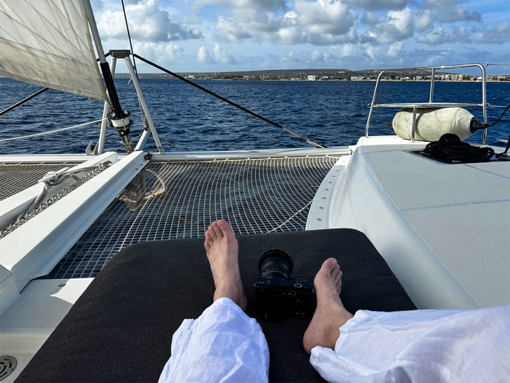 A sunset cruise is a must experience in the Dutch Caribbean while solo traveling.