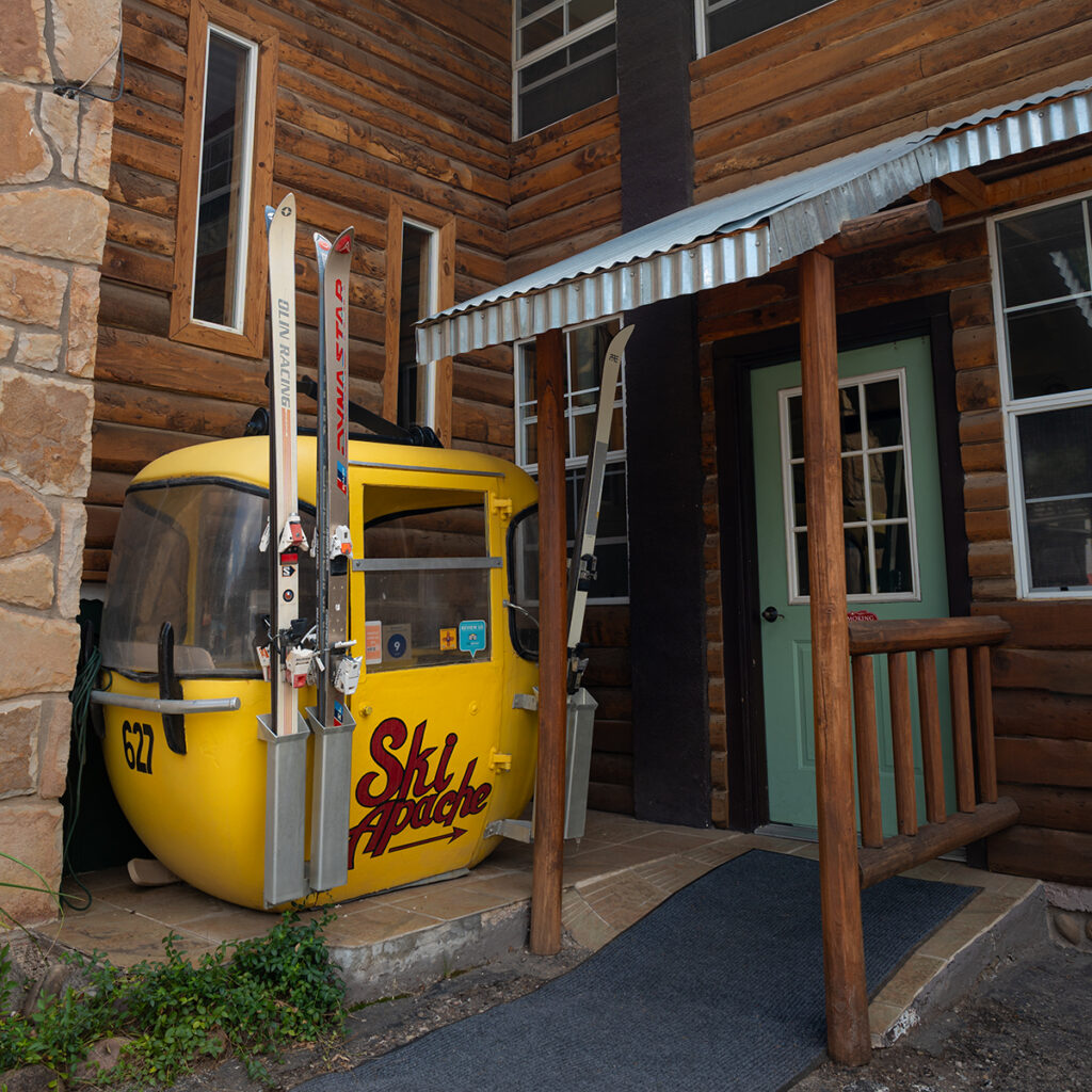 Vintage Ski Apache gondola outside Sitzmark Chalet Inn, in Ruidoso, New Mexico