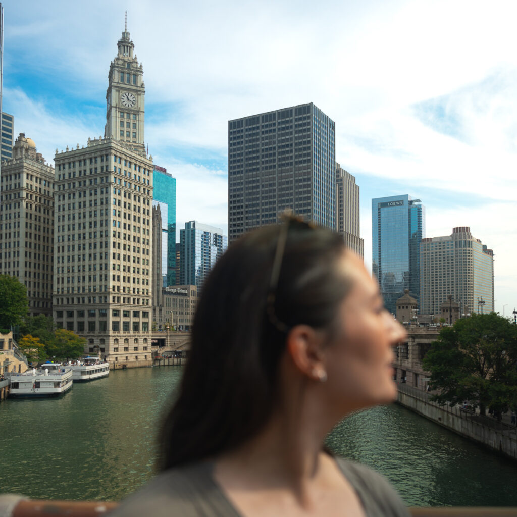 Blurred side profile of Erin Donahue Photography on a bridge above the Chicago River.