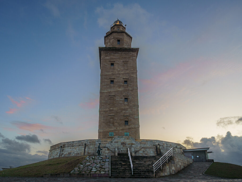 Looking up at Torre de Hercules during sunset. 