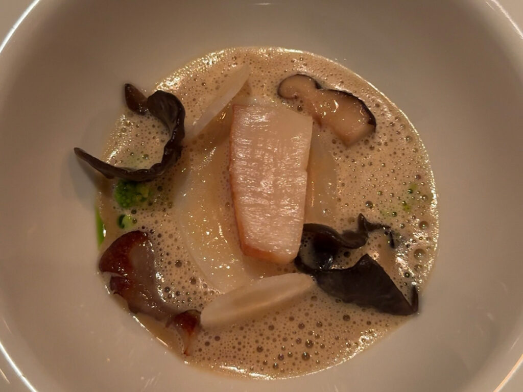 Halibut with scallop and mushrooms in cream sauce — a standout course from the Atera NYC review