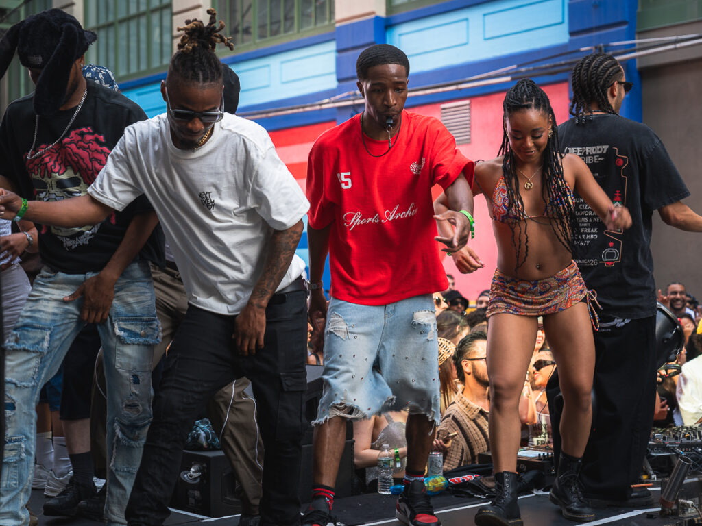 Hip hop and afro dancers performing on stage at Francis Mercier Solèy NYC Industry City Brooklyn.
