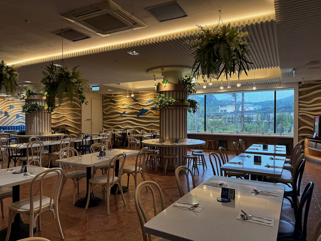 Dining room with wave-mural walls at Caesar Park Hotel Kenting Taiwan.