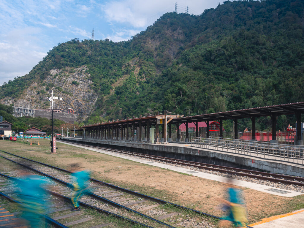 Checheng Station, the terminus of the Jiji Line railway, with the Mingtan hydroelectric dam visible in the mountains behind, Nantou County.