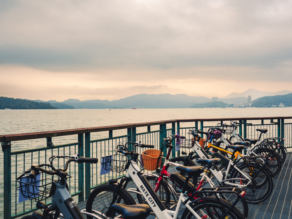 Bike rental station overlooking Sun Moon Lake on a foggy morning, part of a 4 day Taiwan itinerary through Nantou County.