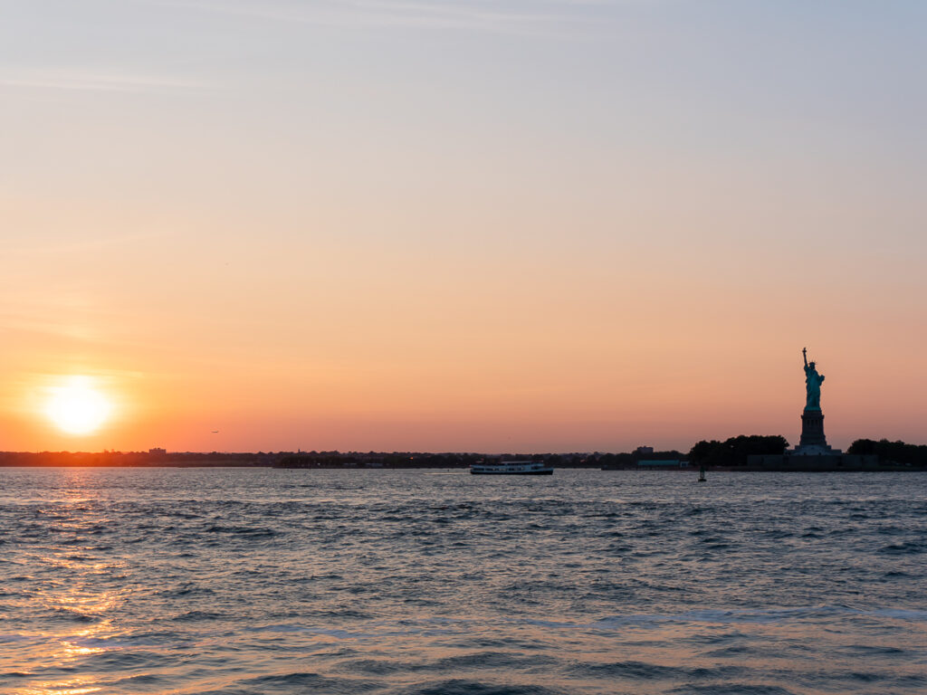 The Statue of Liberty at sunset.