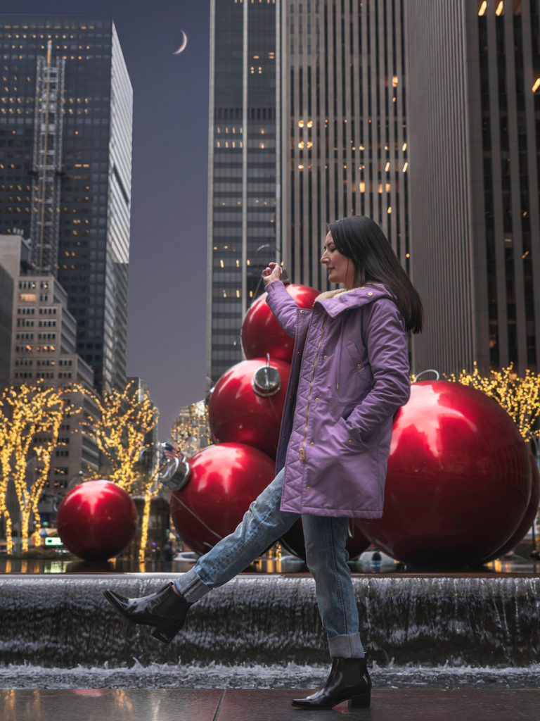 Giant ornaments are displayed all along Avenue of the Americas in Midtown Manhattan.