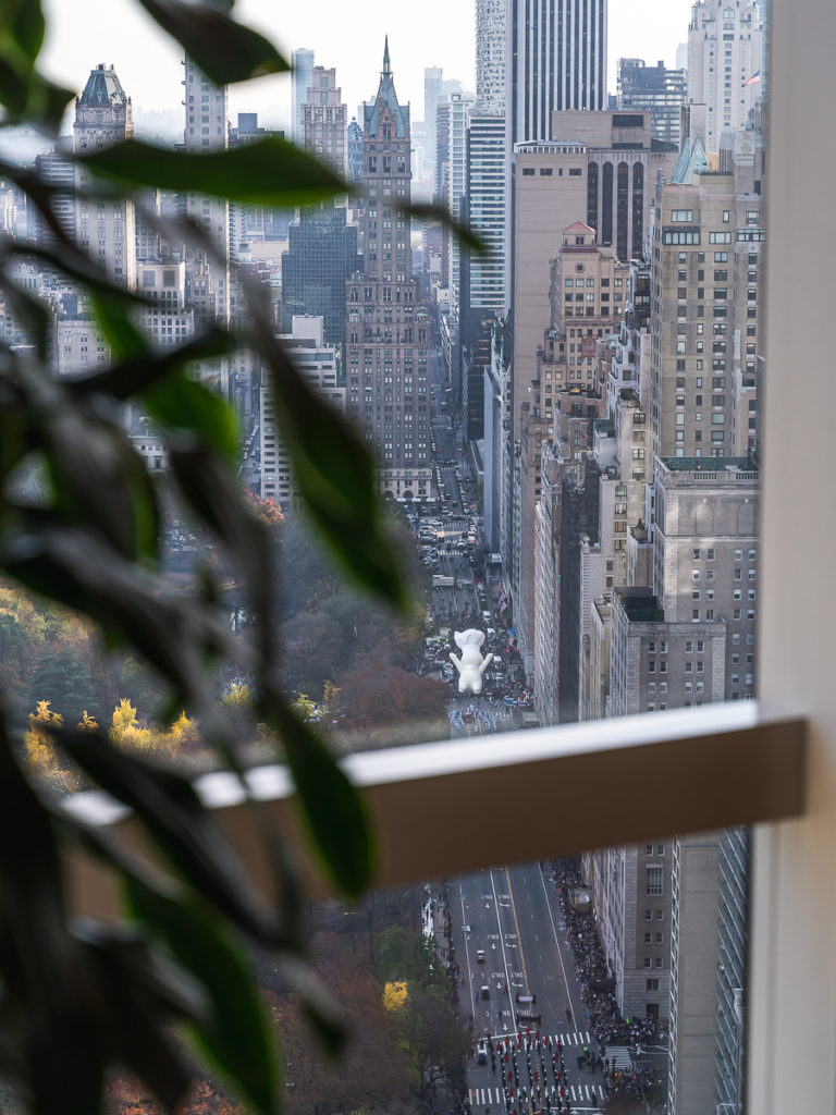 The Pillsbury Dough Boy float can be seen from an interior room at the Mandarin Oriental New York, the best hotel to watch the Macy's Thanksgiving Day Parade.