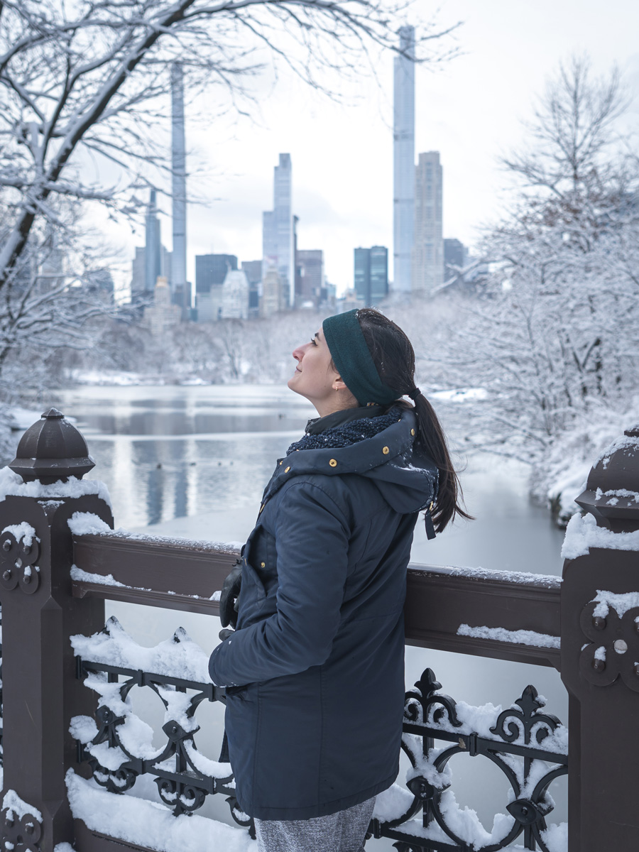 The Oak Bridge is hands down one of the best Central Park photo spots for portraits, even during a snowstorm.