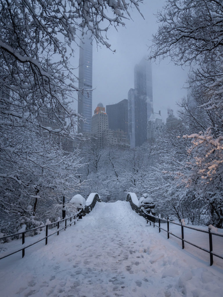 The best Central Park photo spot when there's snow is on top of the Gapstow Bridge.