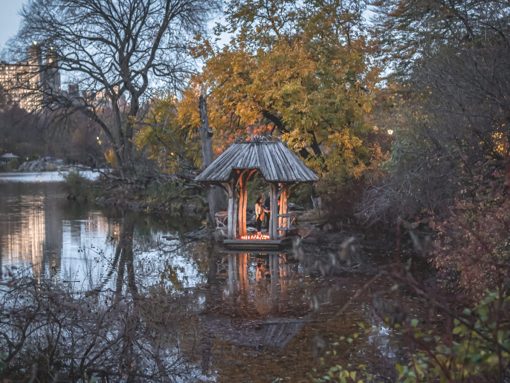 An intimate proposal with candle lights takes place at Wagner Cove, which is a romantic Central Park photo spot.