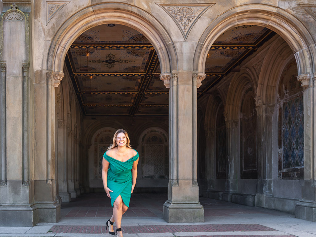 Opera singer Elise Marks in a green dress for her personal branding photoshoot at Bethesda Terrace. 