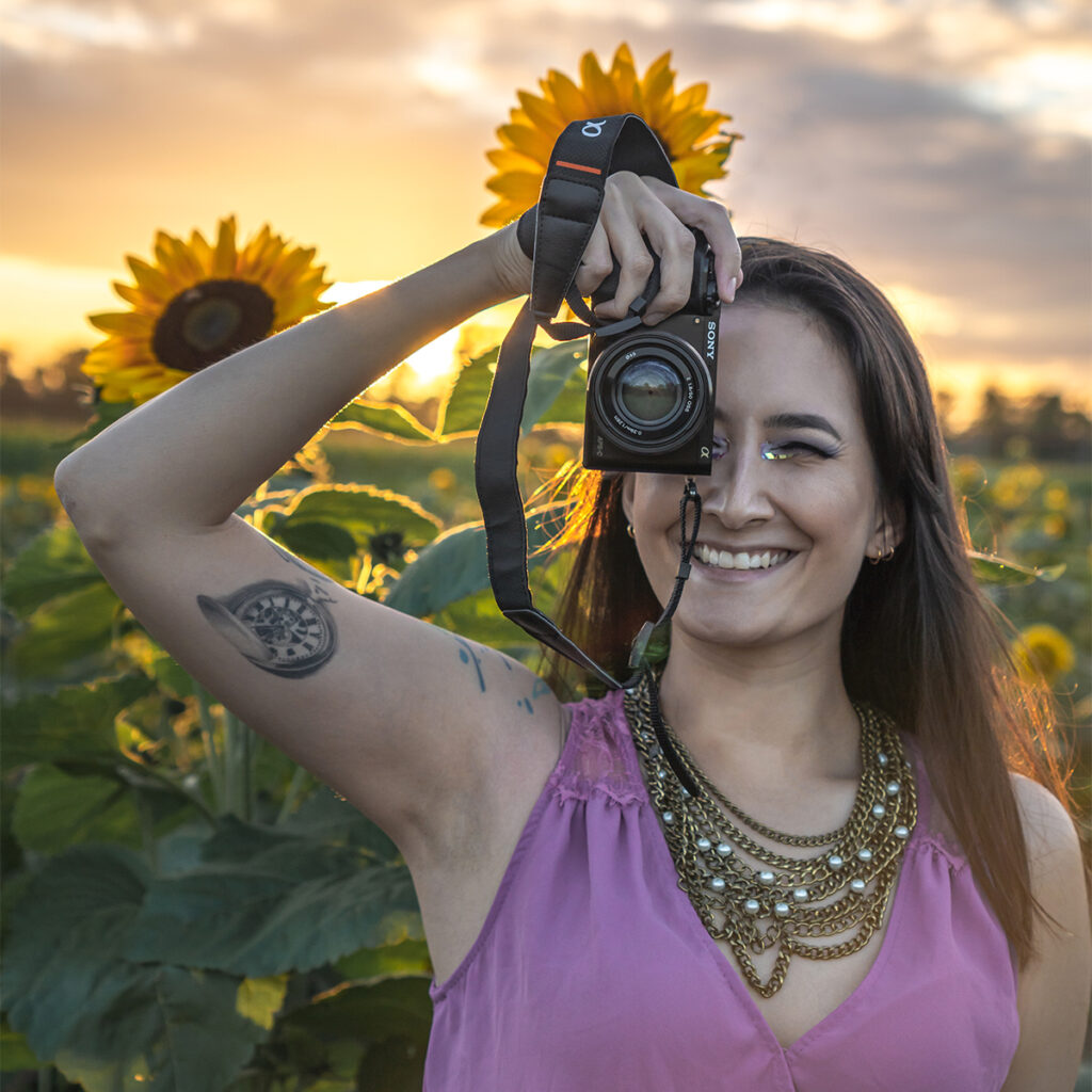 Learn how to take your own self portraits with a camera in a sunflower field.