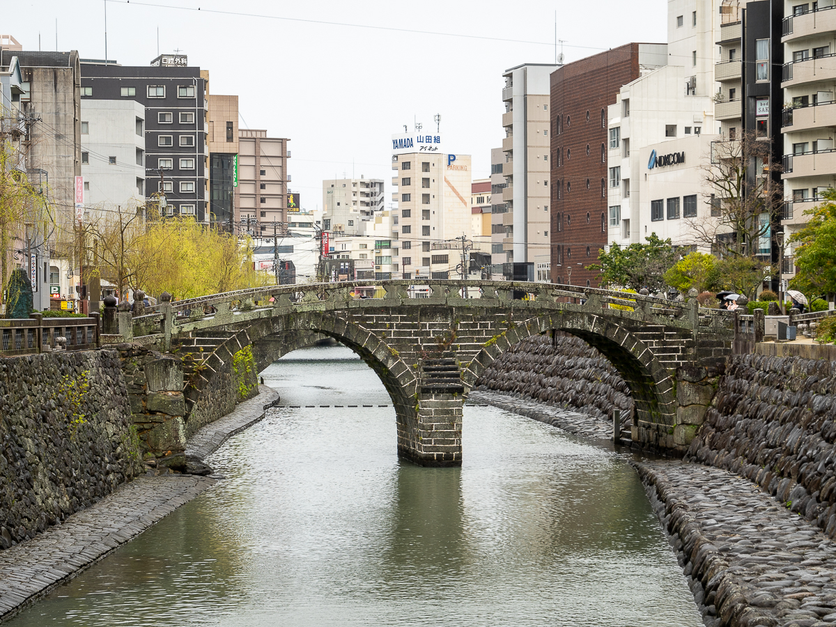 The Meganebashi Bridge is a popular photo spot in Nagasaki because it's the only bridge that has two tunnels while the rest have one.
