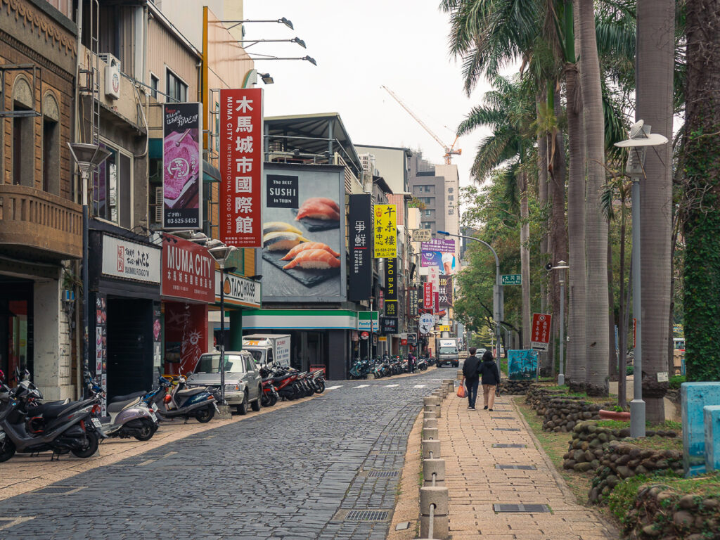 Stores and cobblestone streets can be found in downtown Hsinchu City.